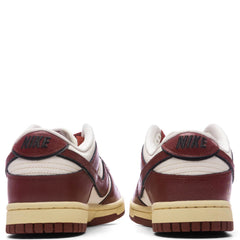 Womens Dunk Low SE Sisterhood Team Red Sail Team Red Black Muslin