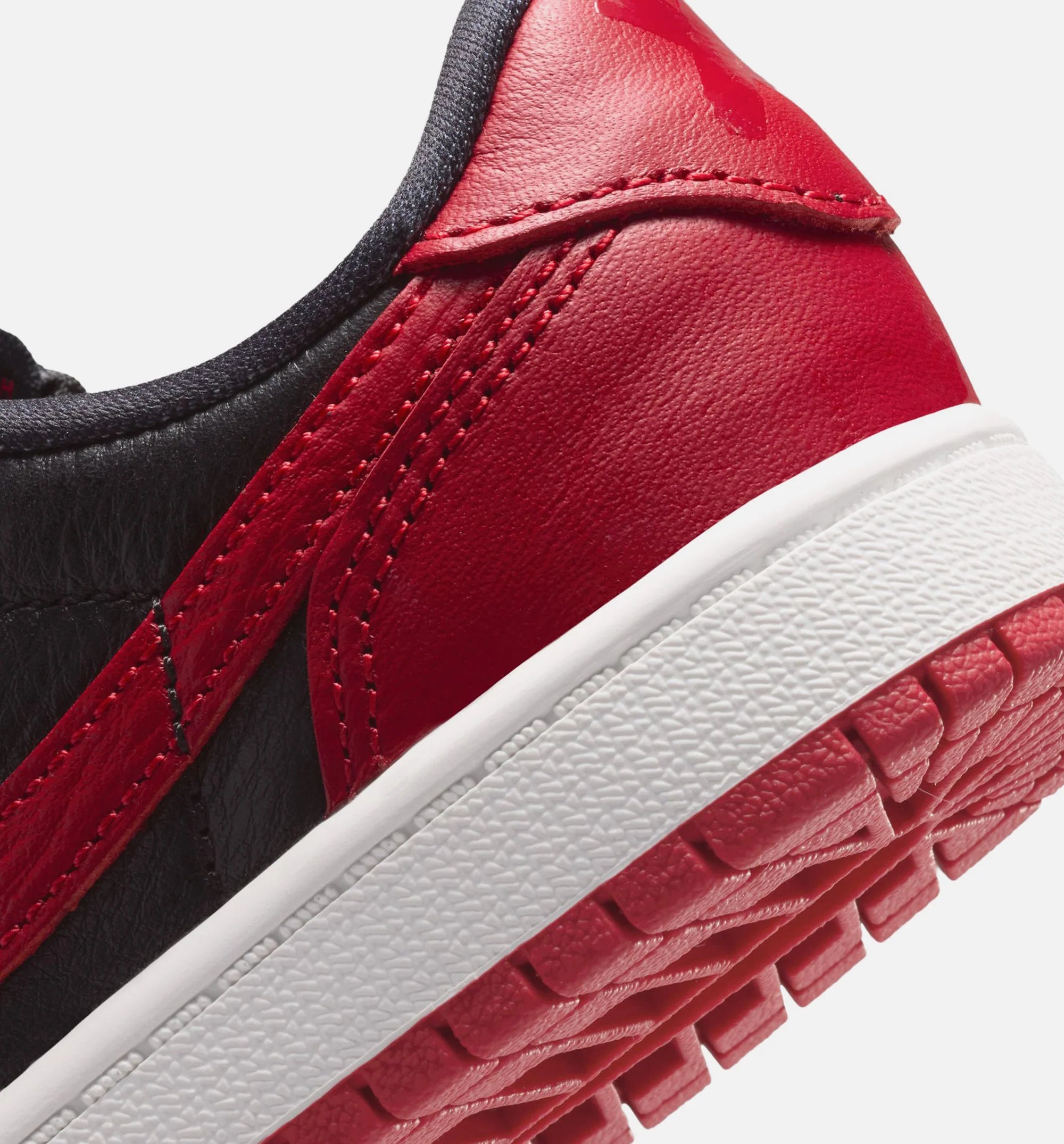 Air Jordan 1 Retro Low OG Banned Preschool Lifestyle Shoe Black Black Varsity Red Summit White Free Shipping